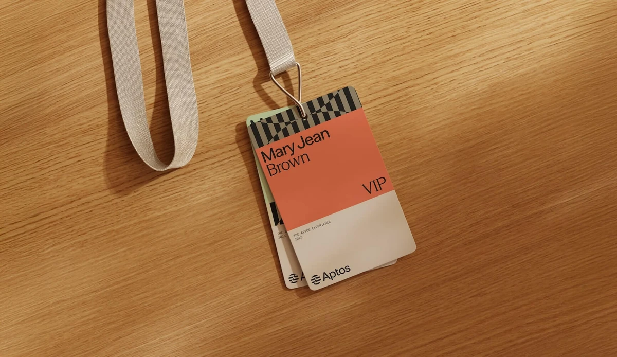 Aptos lanyard and badge on wood