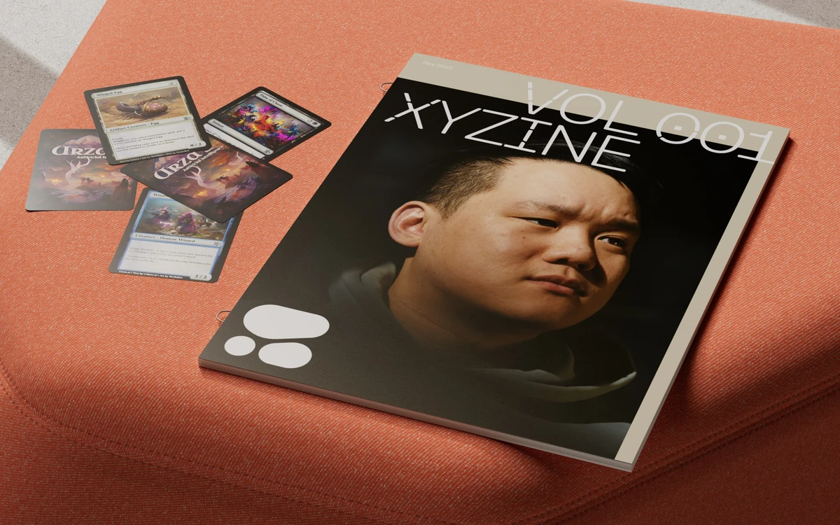 Cohere printed zine spread on a terracotta surface