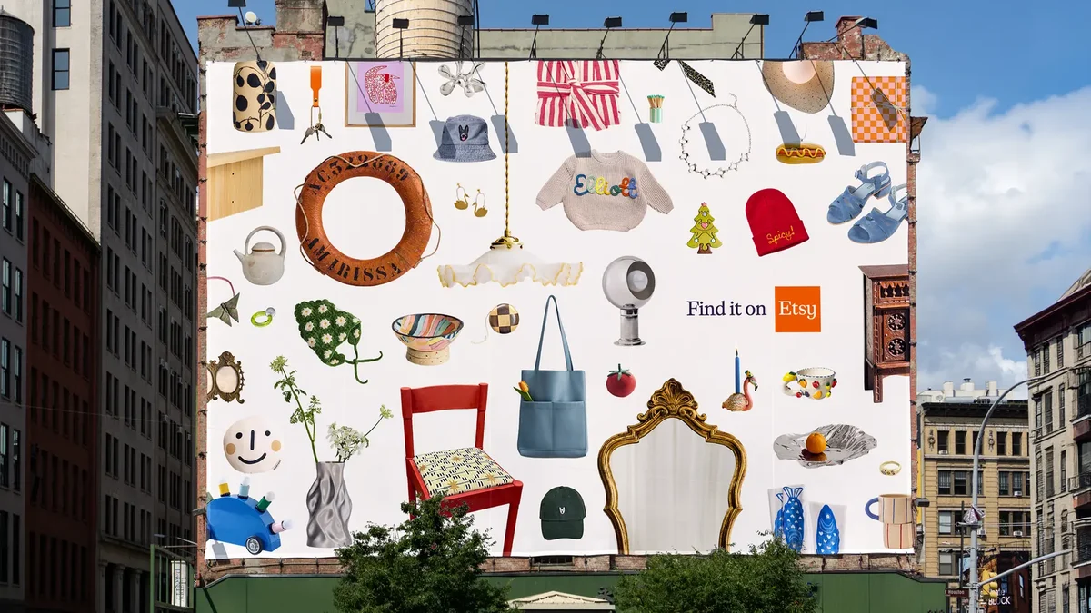 Building-sized Etsy mural of products on a city wall