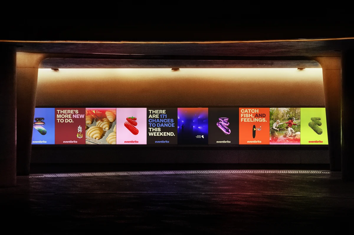 Eventbrite digital screens in a dark corridor