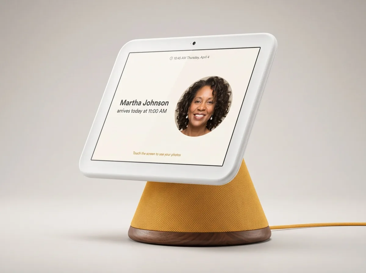 Prototype van het Honor Frame, een touchscreen met witte rand op een mosterdgele stoffen kegel met walnoten voet, dat toont dat een zorgverlener vandaag om 11:00 komt
