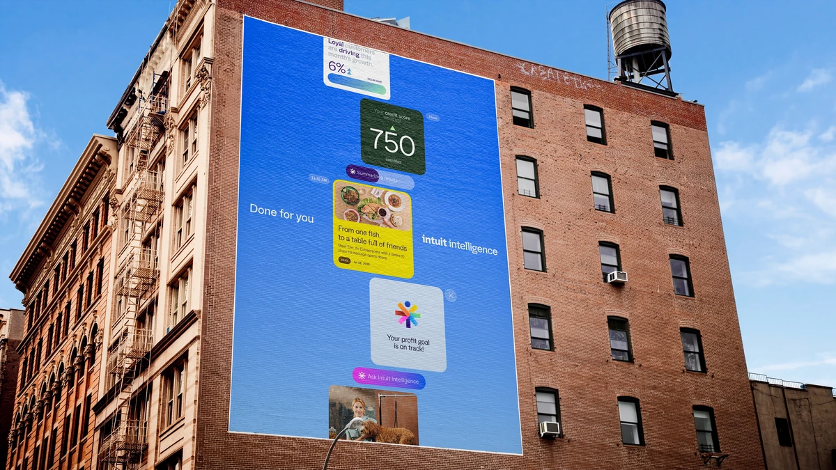 Large Intuit billboard on the side of a brick building