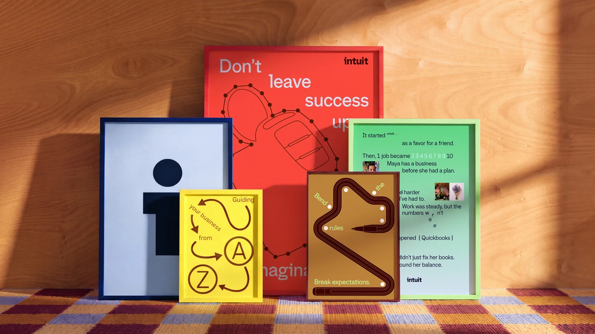Intuit brand pieces and packaging arranged on an orange set