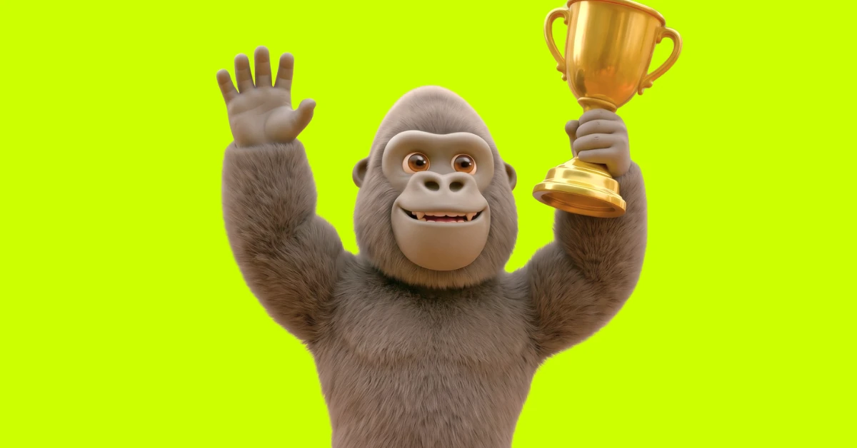 Kong-gorillamascotte met een gouden trofee op zuurgroen