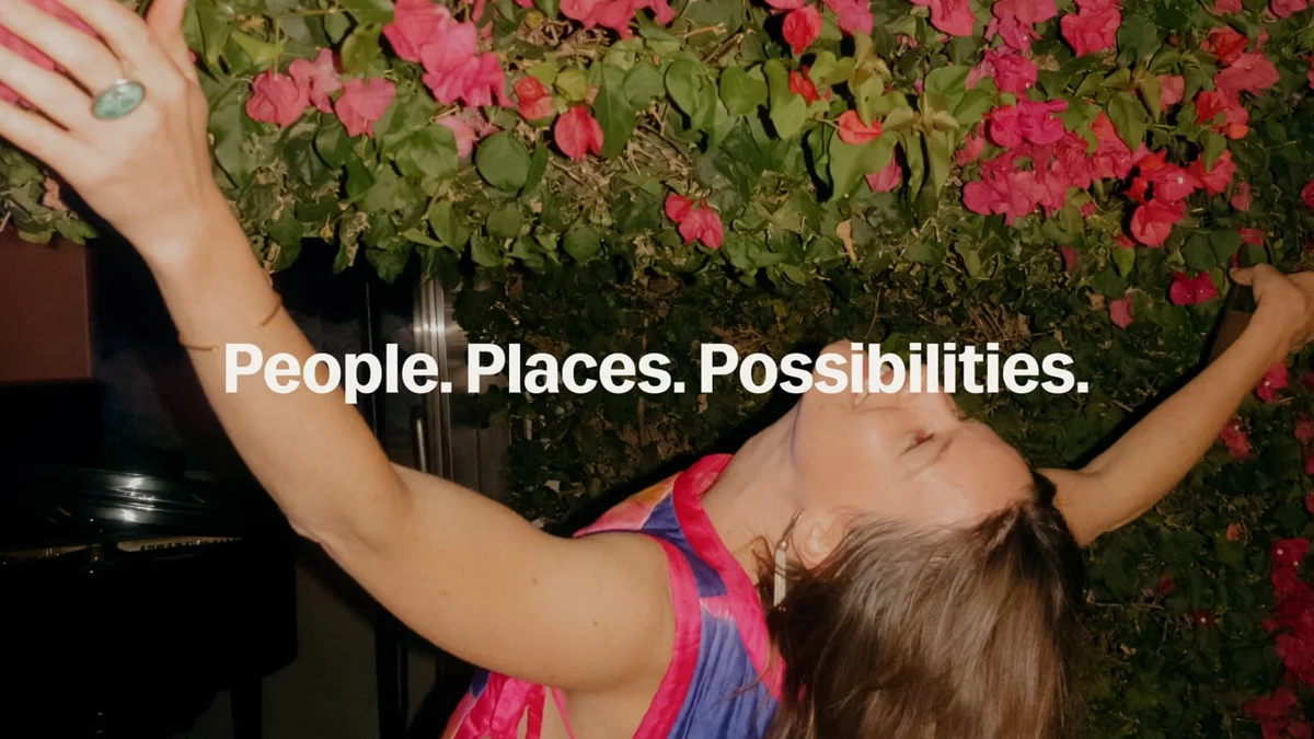 Lyft photo: woman stretching in sunlight, 'People. Places. Possibilities.'