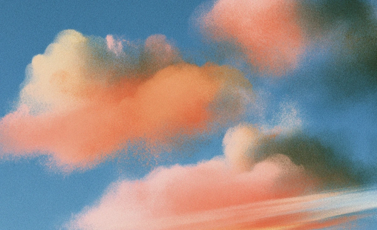 Zachte geschilderde wolken in koraal en blauw, beeld van Microsoft AI