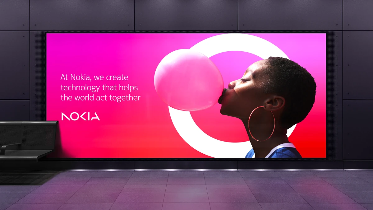 Nokia display screen in a pink-lit event space