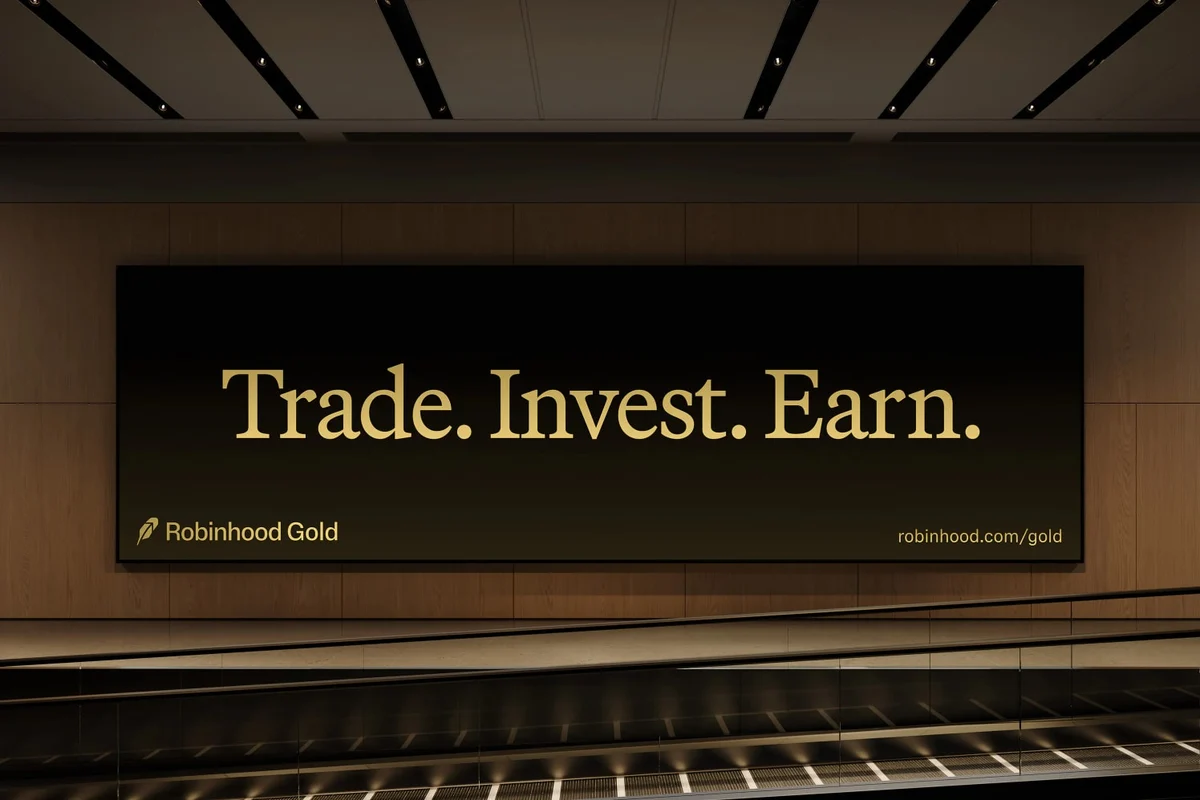 Robinhood Gold billboard: 'Trade. Invest. Earn.'