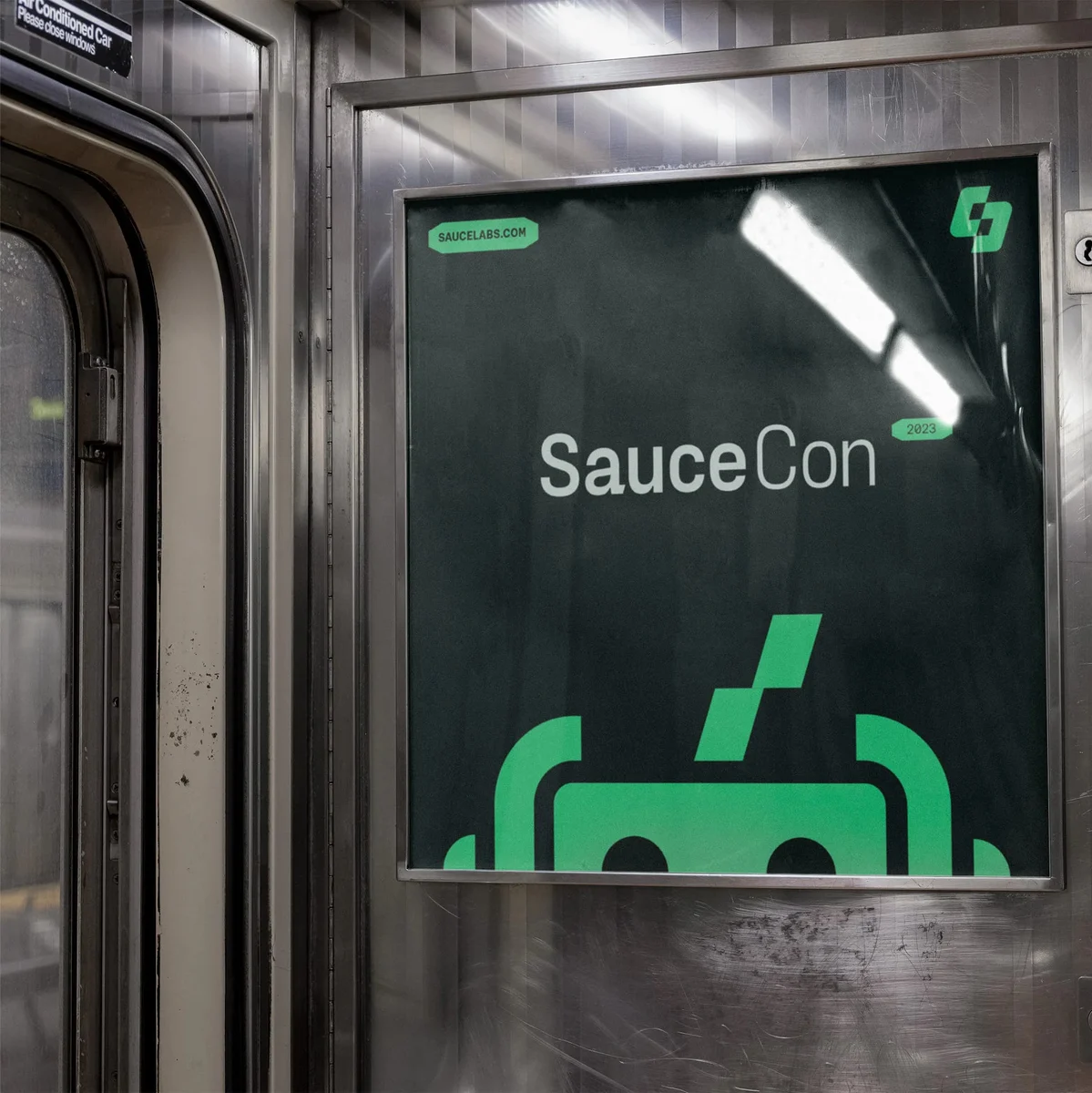 SauceCon sign in a subway car