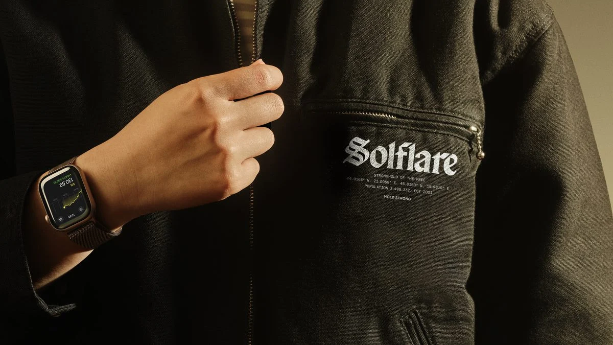 Person in a black jacket with an embroidered Solflare wordmark