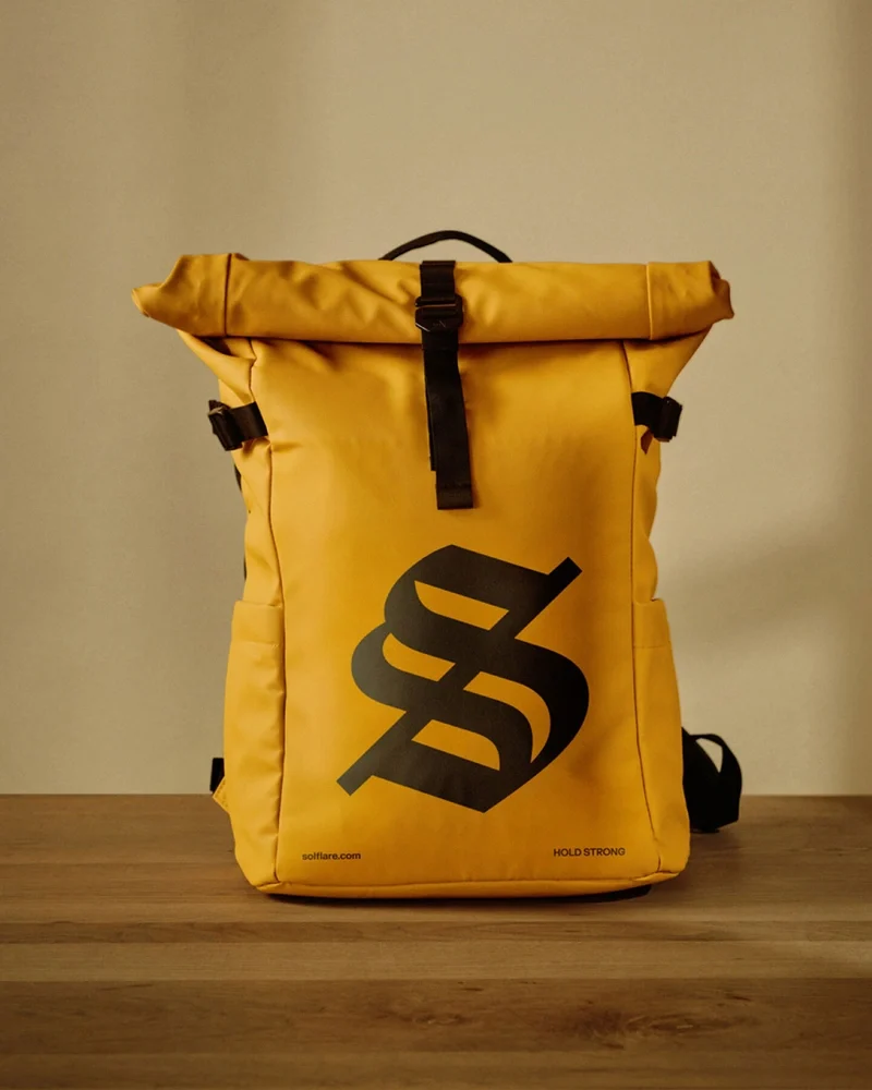 Yellow Solflare backpack with the S monogram