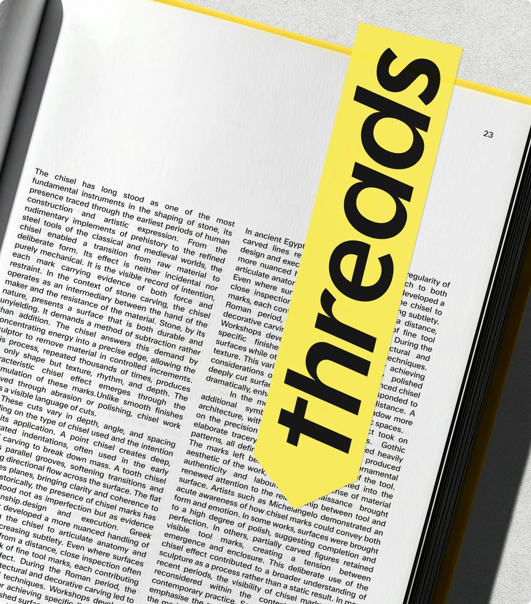 Newspaper with a yellow Threads ad strip
