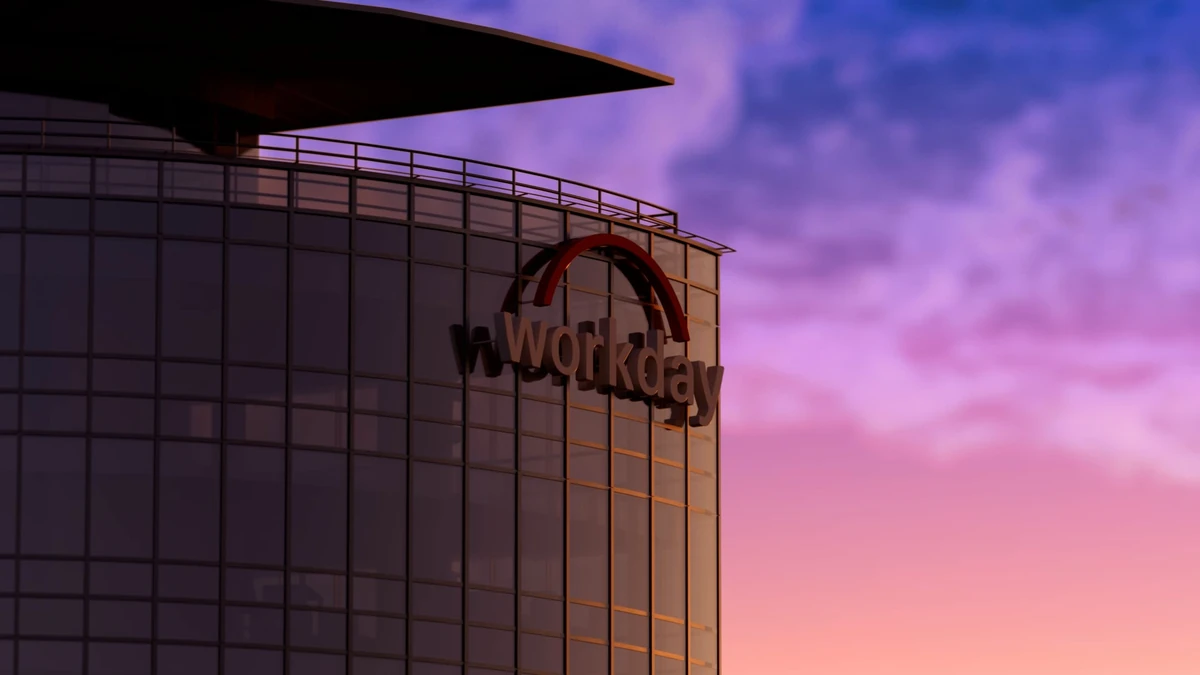Workday sign on a building at dusk